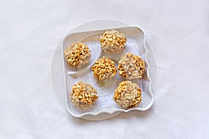 Bengali Traditional Puffed Rice Balls is a sweet made using puffed rice mixed with jaggery, Murmura Laddoo, Churmura Laddoo or