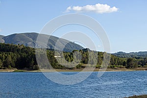 Beniarrés reservoir with the Almudaina mountain range in the background