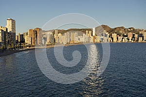 Benidorm , beach panorama and skyline at sunset.Famous vacations destination in Costa Blanca, Spain.Summer and holidays background