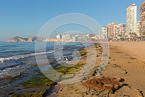 Benidorm beach Spain with waves and seafront