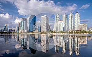 benjakiti park with blue sky and river in Bangkok city