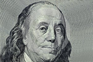 Benjamin Franklin close-up on a gray background