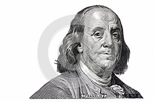 Benjamin Franklin cut on new 100 dollars banknote isolated on white background photo