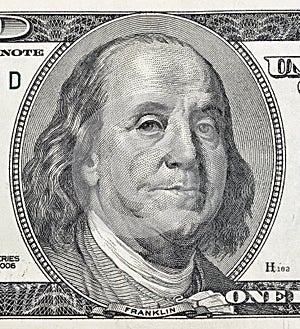 Benjamin Franklin portrait on one hundred dollar bill closeup