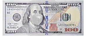 Benjamin Franklin portrait wearing mask against covid 19 , 100 Dollars banknotes bill