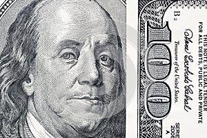 Benjamin Franklin`s eyes from a hundred-dollar bill. The eyes of Benjamin Franklin on the hundred dollar banknote, backgrounds, photo