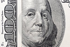 Benjamin Franklin`s eyes from a hundred-dollar bill. The face of Benjamin Franklin on the hundred dollar banknote, backgrounds,