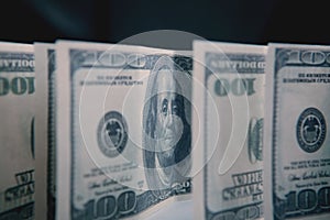 Benjamin Franklin`s face on the 100 dollar bill