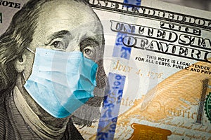 Benjamin Franklin With Worried and Concerned Expression Wearing Medical Face Mask On One Hundred Dollar Bill