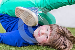 Bent girl lying on her back