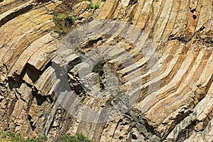 Bent hexagonal columns of volcanic origin at the Hong Kong Global Geopark in Hong Kong, China.