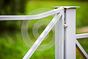 Bent metal fence. Concept of vandalism