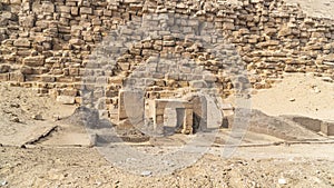 The Bent Pyramid is an ancient Egyptian pyramid located at the royal necropolis of Dahshur, approximately 40 kilometres south of