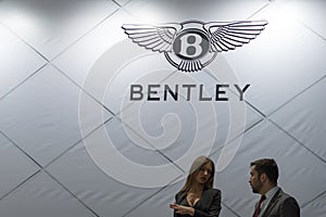 Bentley logo luxury carmaker with salesmen