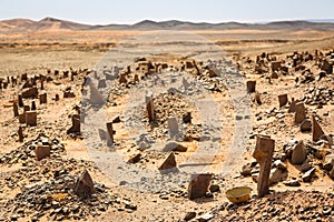 Berber old cemetery on the edge of Sahara desert in Morocco.