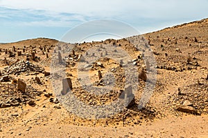 Berber old cemetery on the edge of Sahara desert in Morocco.