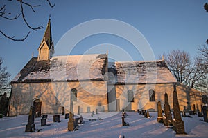 Berg Church in winter garb and sunset