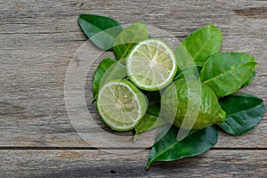 Bergamot with green leafs on wood photo