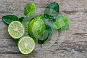 Bergamot with green leafs on wood table