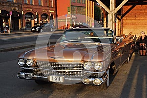 Classic car automobile parked on asphalt road in Bergen, Norway