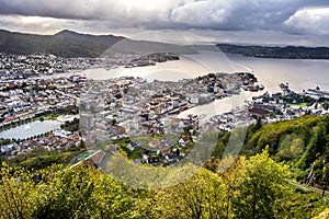 Bergen, Norway - Panoramic city view with Bergen Vagen harbor - Bergen Havn - and historic Bryggen heritage district seen from