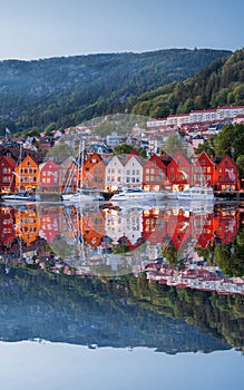 Bergen street at night with boats in Norway, Unesco World Heritage Site