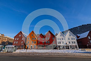Bergen waterfront cityscape.with pucturesque bryggen houses in colorful theme in front of the wharf. Looking from across the