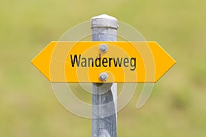 Bergwanderweg sign in the mountains, navigation for hikers