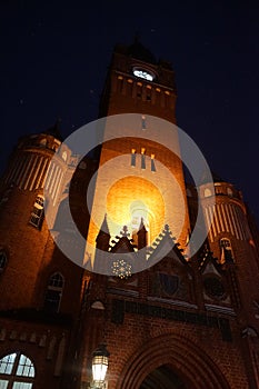 Luminous clock on the clock tower of Koepenick Town Hall. Berlin, Germany photo