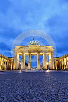 Berlin Brandenburger Tor Brandenburg Gate in Germany at night blue hour portrait format copyspace copy space