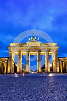 Berlin Brandenburger Tor Gate in Germany at night blue hour copyspace copy space portrait format