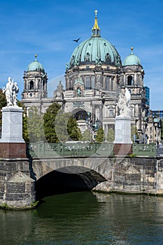 The Berlin Cathedral with a bridge over the river Spree photo