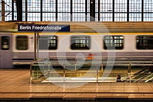 Berlin Friedrichstrasse station sign at train station in Berlin, Germany