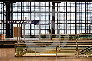 Berlin Friedrichstrasse station sign at train station in Berlin, Germany