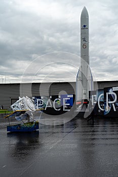 Model of the Ariane 6 space rocket by Arianespace in front of the space pavilion.