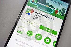 Berlin, Germany - November 19, 2017: Google Maps application on screen modern smartphone in Play Store. Google apps