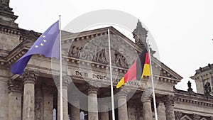 Berlin.Germany. Parliament of the Bundestag and the developing German flag