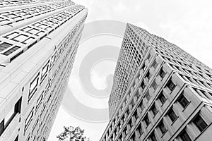 Two buildings rising from street high-rise converging perspective in Potsdamer Platz Berlin