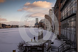 Berlin, Germany in winter. Frozen river Spree in Kreuzberg, sunset light photo