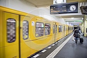 Berlin Germany yellow U-bahn at underground station Friedrichstrasse