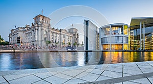 Berlin government district with Reichstag building at dusk, Germany