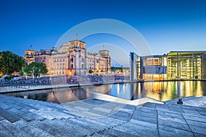 Berlin government district with Reichstag building at dusk, Germany