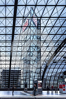 Berlin hbf train station Germany 31-8-2018. View of the perreon where people are waiting for the train. The glass roof of the sta