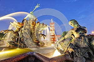 Berlin Neptune fountain in Alexanderplatz With Rotes Rathaus