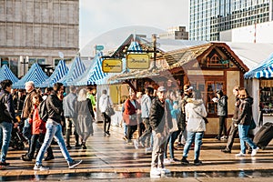 Berlin, October 03, 2017: Celebrating the Oktoberfest. People walk on the street market on the famous Alexanderplatz