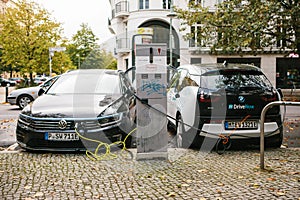 Berlin, October 2, 2017: Electric cars are being charged at a special place for charging electric vehicles. A modern and