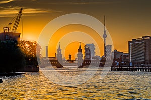 Berlin skyline with Spree river at sunset, Germany