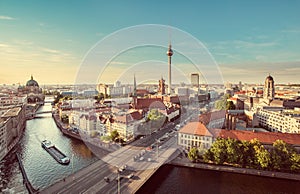 Berlin skyline with Spree river at sunset, Germany photo