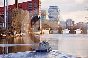 Berlin spree river boat and cityscape