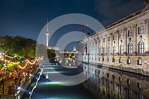 Berlin Strandbar party at Spree river with TV tower at night, Germany